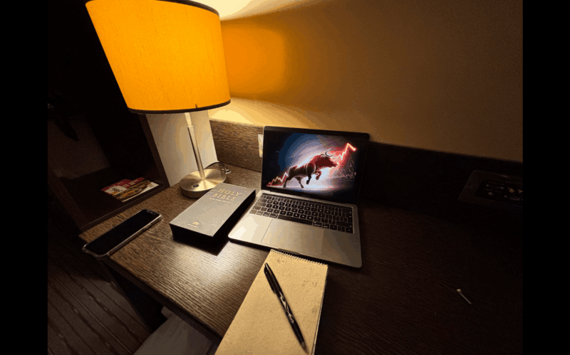 Workspace with laptop showing amazon affiliate marketing notes