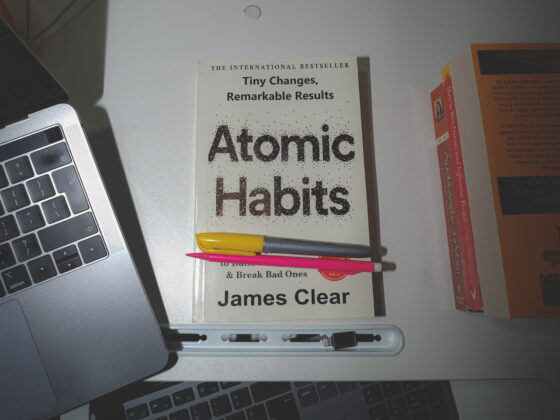 image of Atomic Habits book with stationery items
