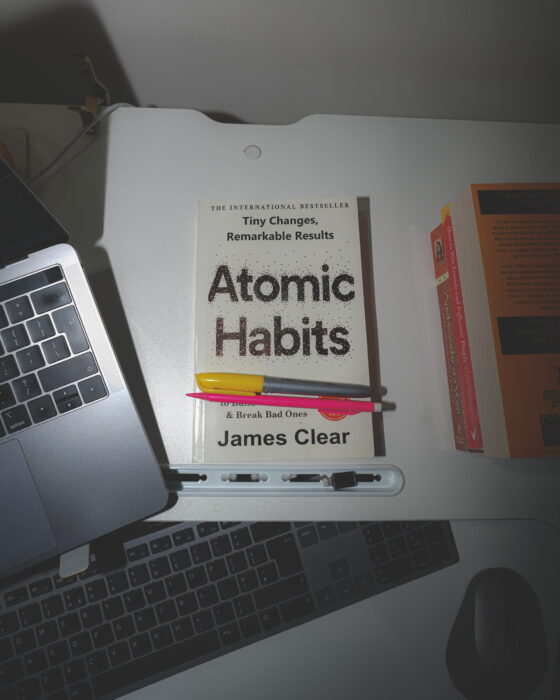 image of Atomic Habits book with stationery items