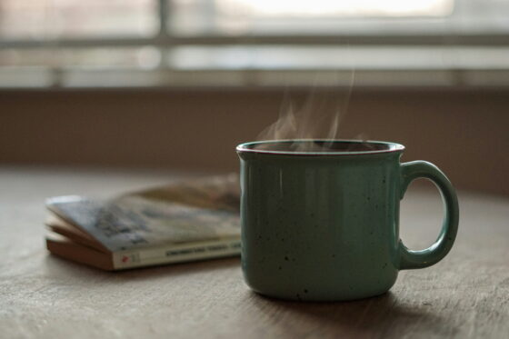 A quiet morning coffee on a simple table, reflecting a modern minimalist lifestyle