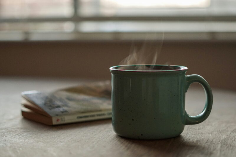 A quiet morning coffee on a simple table, reflecting a modern minimalist lifestyle